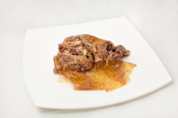 Stew in jelly on a white background