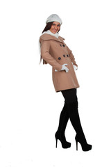 Woman in outrwear, white scarf and hat