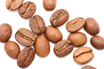 Brown coffee beans isolated on white background