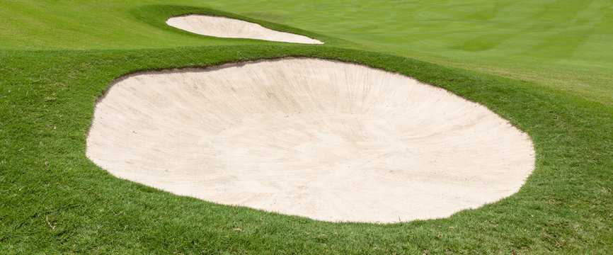 Sand bunker on the beautiful golf course