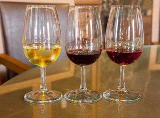 glasses of  white and ruby port wine