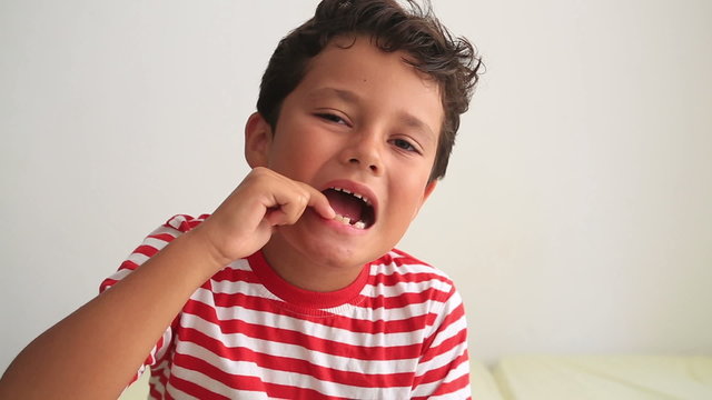 Child showing missing teeth