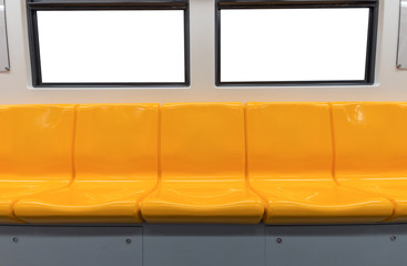 Yellow chair and windows in electric train