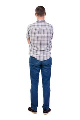 Fototapeta premium Back view of handsome man in shirt.