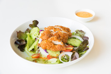 Fried Chicken salad with tomatoes,  Cucumber and Onion.