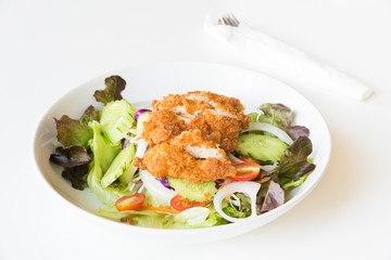 Fried Chicken salad with tomatoes,  Cucumber and Onion.