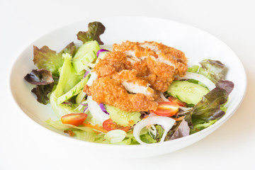 Fried Chicken salad with tomatoes,  Cucumber and Onion.
