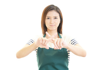 禁止の意思表示をする女性