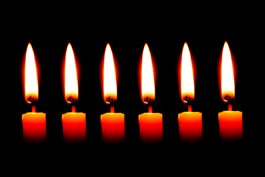 six Candle on black background