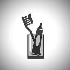 Toothbrush toothpaste and glass