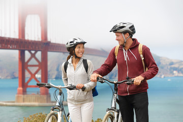 Biking Golden Gate Bridge - couple sightseeing