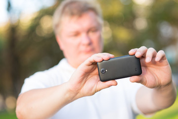 people photographed on a smartphone