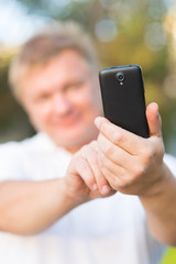 people photographed on a smartphone