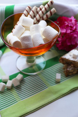 Fototapeta na wymiar Sweet marshmallows on table, close-up