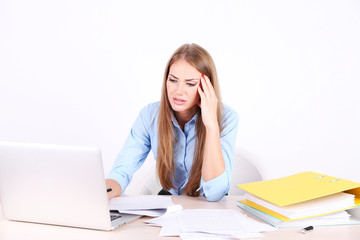 Business woman with documents at her workplace