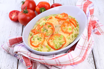 Casserole with vegetables in bowl  on table close-up
