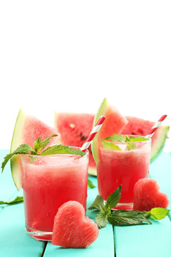 Watermelon cocktail on table, isolated on white