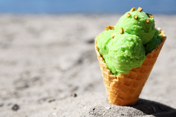 Ice cream in sand on beach