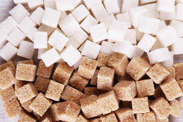 Brown and white refined sugar background