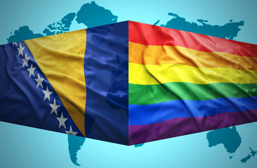 Waving Bosnian and Gay flags