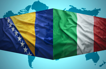 Waving Bosnian and Italian flags