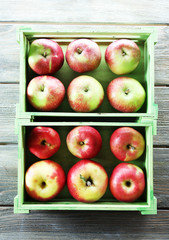 Juicy apples in box, close-up