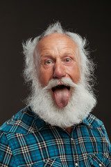 old man with a long beard with big smile