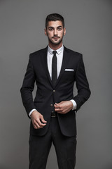 handsome elegant man on grey background