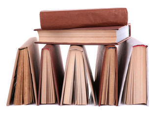 Books in a mess isolated on white