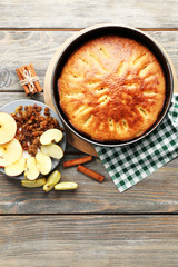 Homemade apple pie on wooden table