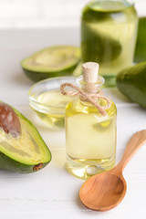 Avocado oil on table close-up