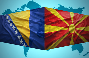 Waving Macedonian and Bosnian  flags