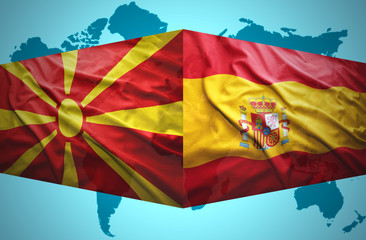 Waving Macedonian and Spanish flags