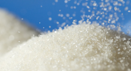 sugar on a blue background