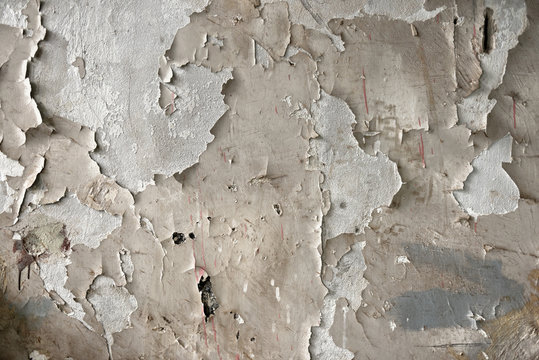 White Peeling Paint On The Wall