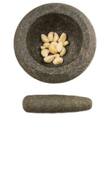 Stone Mortar And Pestle With Garlic