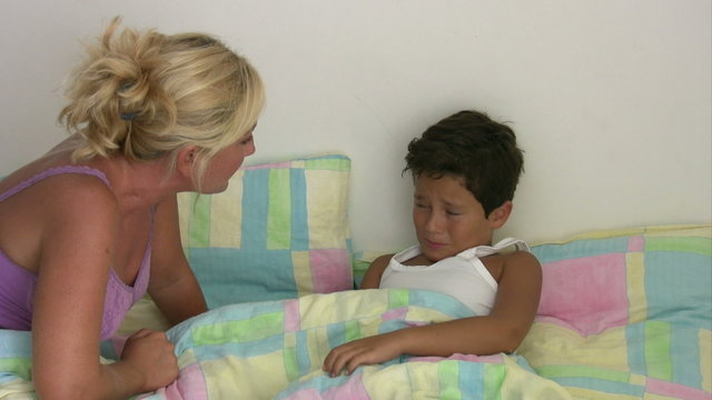 Angry mother scolding his son