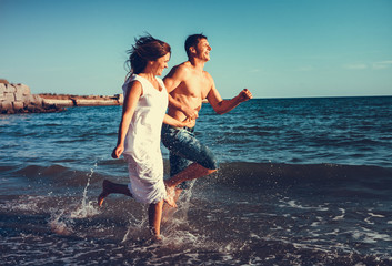Romantic couple having fun on the beach
