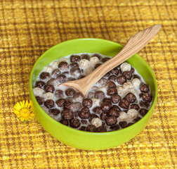 Breakfast cereals, chocolate balls with milk