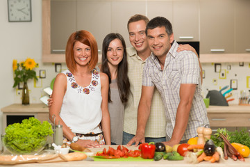 happy friends cooking