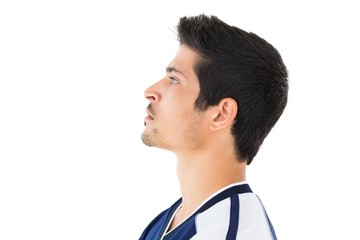 Side view of football player looking up