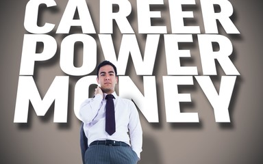 Composite image of unsmiling businessman standing