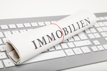 immobilien zeitung auf tastatur