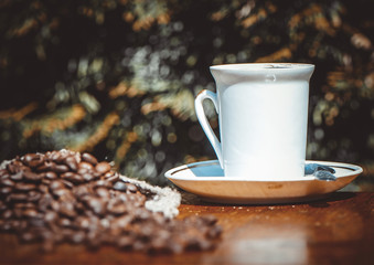 Coffee cup and saucer on a wooden table