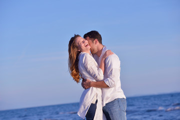 young couple  on beach have fun