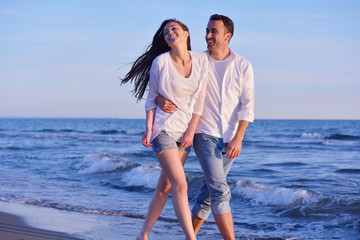 young couple  on beach have fun