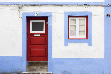Obraz na płótnie Canvas Old Portuguese facade with door and window