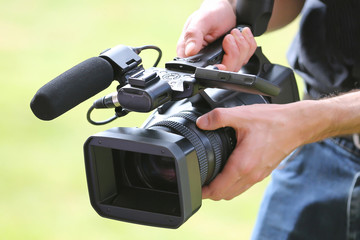 Video camera man with camera