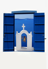 Open traditional Greek blue window on Santorini island, Greece