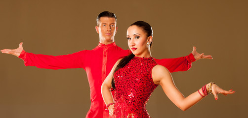 latino dance couple in action - dancing wild samba